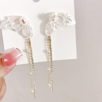 Aretes Mariposa 3D con Diamantes y Borlas Brillantes - Image 9