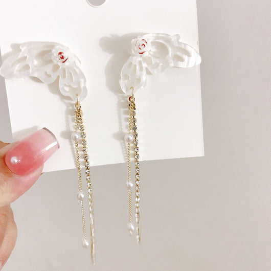 Aretes Mariposa 3D con Diamantes y Borlas Brillantes - Image 9