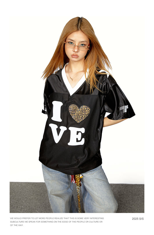 Playera Mujer Cuello V Leopardo con Splicing - Manga Corta - Image 11