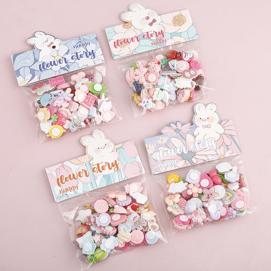 Pack of colorful cartoon plastic stickers featuring cherries, strawberries, flowers, cookies, and rainbows, in a clear bag with a "bunny flower story" header. - Image 13
