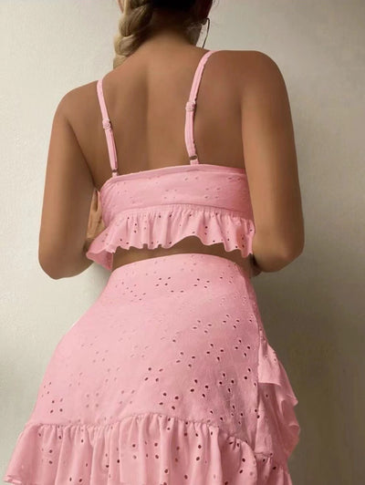 Light blue eyelet two-piece swimsuit set with a tie-front crop top and a matching ruffle-trim hip-hugging skirt. - Image 31