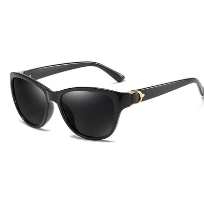 Brown plastic frame sunglasses with brown polarized lenses and gold-tone accents on the temples. - Image 4