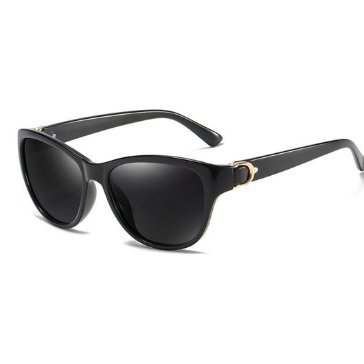 Brown plastic frame sunglasses with brown polarized lenses and gold-tone accents on the temples. - Image 4