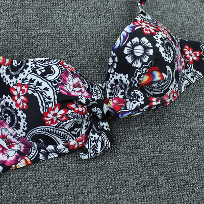Olive green floral print bikini top with tie-front and solid high-waisted ruched bottoms on a grey background. - Image 7