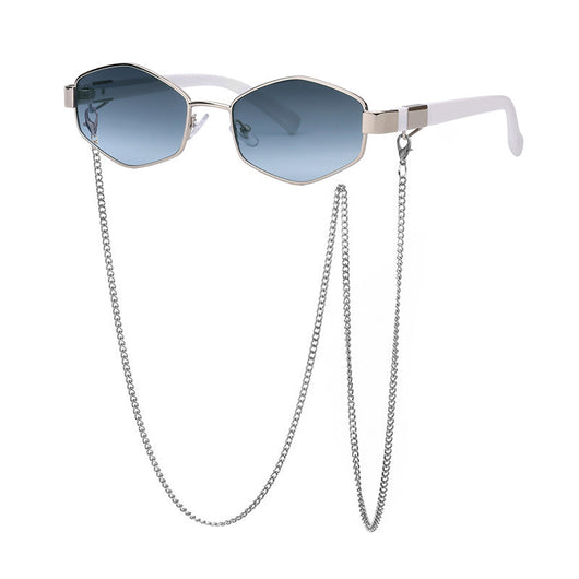 Women's hexagonal sunglasses with dark lenses, gold-colored metal frame, black temples, and a detachable gold chain. - Image 9