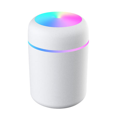 Dark gray ultrasonic aromatherapy essential oil diffuser with a colorful LED light band and rainbow top light. - Image 19