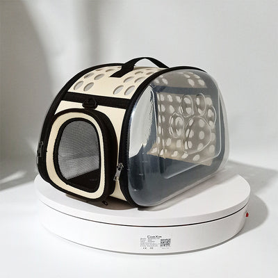 Gray and black pet carrier with a clear bubble window featuring paw prints and a mesh side for ventilation. - Image 6