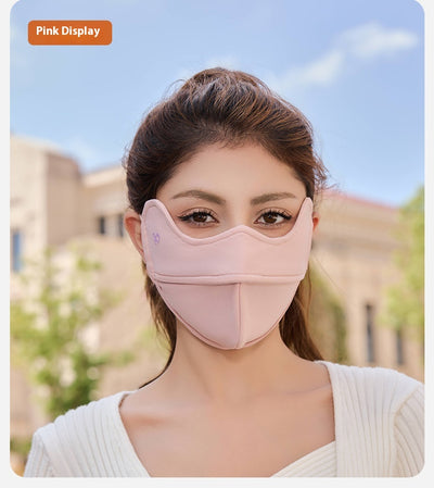 Woman wearing a grey outdoor cycling wind mask with ear hooks and a small heart logo, designed for cold-proof eye protection. - Image 23
