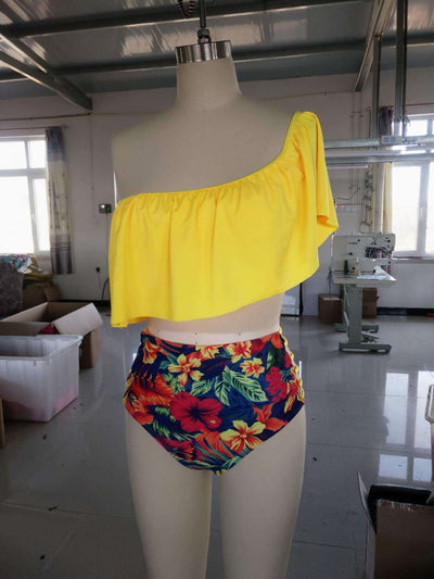 Vibrant one-shoulder ruffle print swimsuit with a lace-up top and high-waisted ruched bottoms, featuring a tropical floral pattern. - Image 3