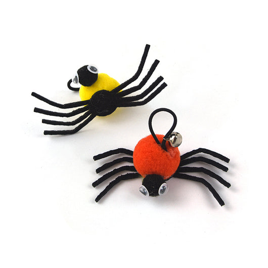 Orange and black plush spider cat toy with googly eyes and a silver bell on a white background. - Image 3