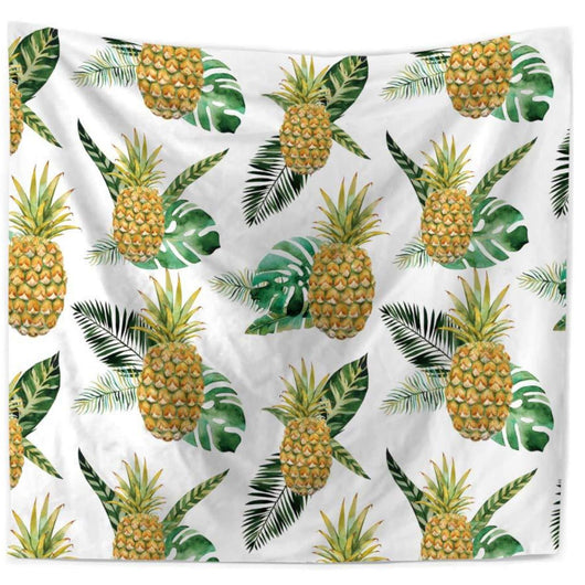 White tapestry with a repeating watercolor pattern of golden pineapples and green tropical leaves, including monstera and palm fronds.