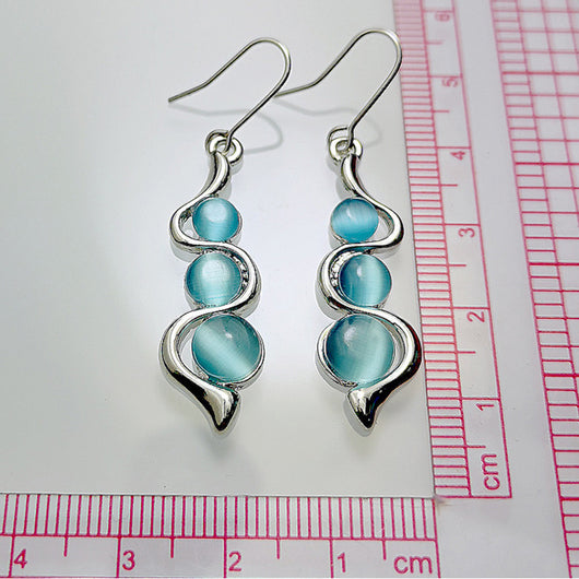 Aretes Ondulados Estilo Bohemio con Gema Ojo de Gato - Image 7