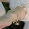 Pulsera de Jade Hetian Natural con Diseño Étnico Tradicional