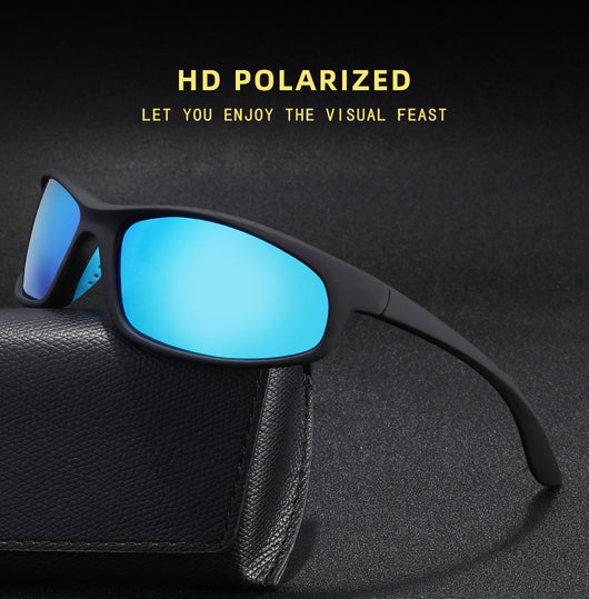 Black sports sunglasses with dark gray lenses and a matte finish, featuring a wrap-around frame style.