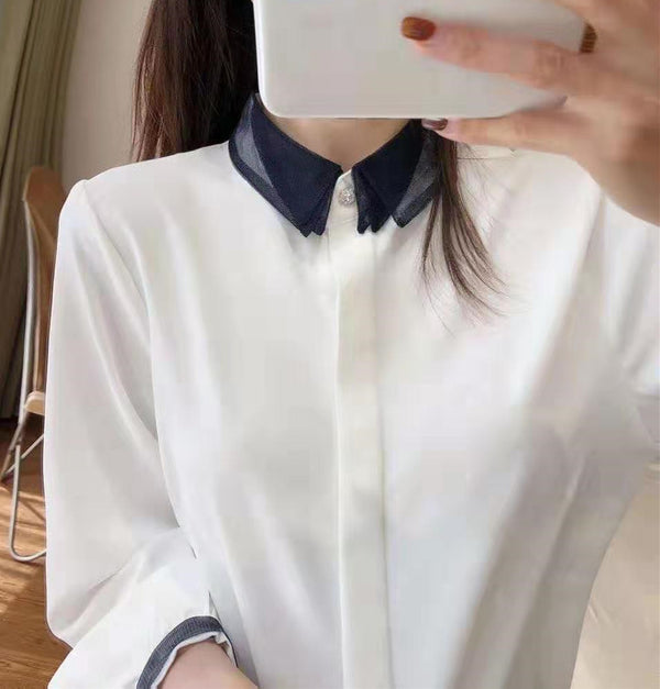 Blusa Elegante de Contraste con Encaje de Malla y Cuello Solapa