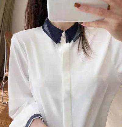 Blusa Elegante de Contraste con Encaje de Malla y Cuello Solapa