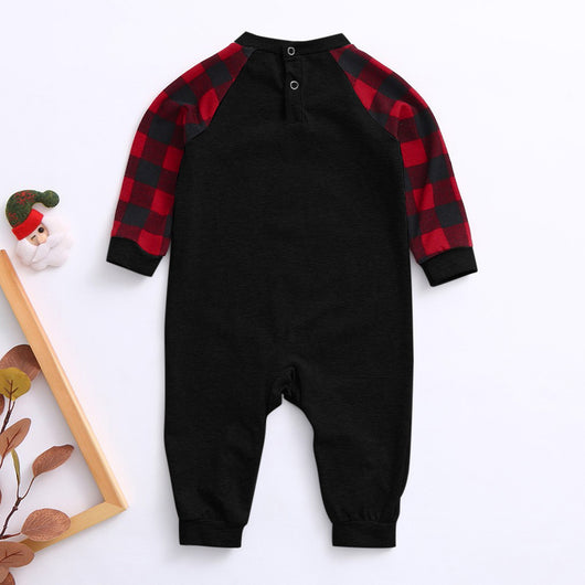 Kids' Christmas pajamas with a black long-sleeve top featuring a cartoon bear in a plaid scarf and ice skates, paired with red and black plaid pants. - Image 21