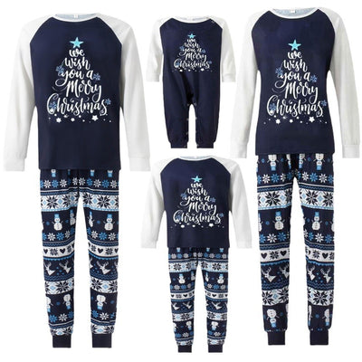 Matching family pajamas with navy blue and white raglan tops featuring a 'Let it Snow' graphic and snowman hat. Bottoms have a festive pattern of snowflakes, sn - Image 5