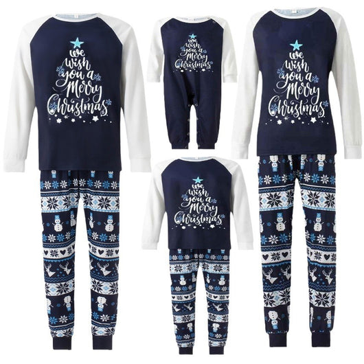 Matching family pajamas with navy blue and white raglan tops featuring a 'Let it Snow' graphic and snowman hat. Bottoms have a festive pattern of snowflakes, sn - Image 5