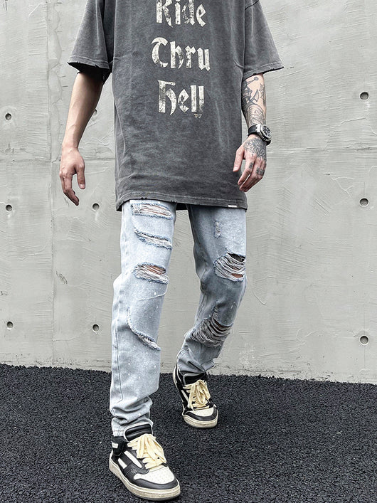 Jeans Slim Fit Desgastado con Roturas Estratégicas y Efecto Tinta - Image 7