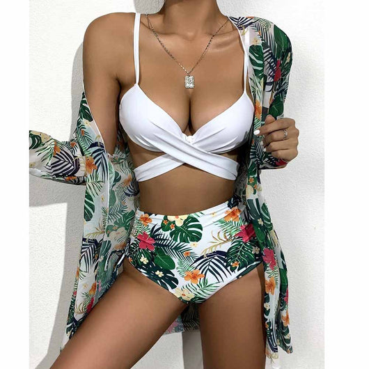 White criss-cross bikini top with high-waisted tropical floral print bottoms and matching long-sleeved cover-up. - Image 20