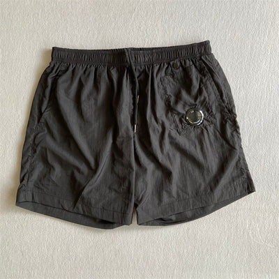 Pantalones Cortos Deportivos Sueltos de Nylon para Playa - Estilo Juvenil Verano - Image 3