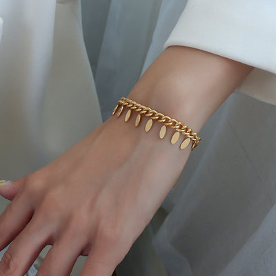 Pulsera de Cadena Elegante con Hoja y Borla - Image 4