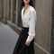 Blusa Elegante con Efecto Capas y Mangas Abullonadas