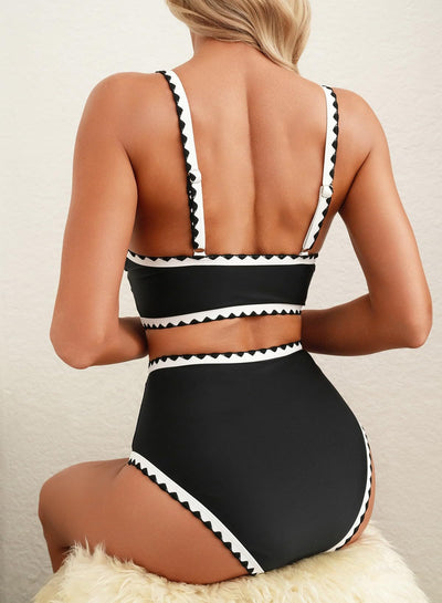 Green and white floral paisley high-waisted bikini swimsuit with scalloped edges on a model. - Image 19