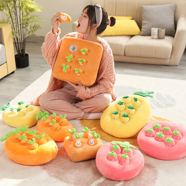 Orange plush carrot-shaped pet toy with four smaller removable carrots, featuring green tops and embroidered sleepy eyes.
