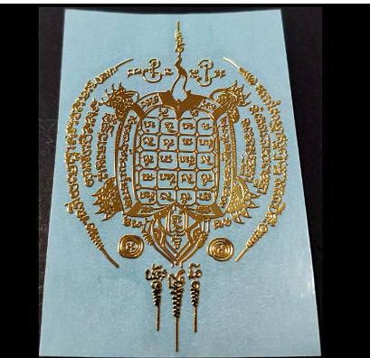 Gold foil sticker featuring a stylized turtle with intricate Thai script and patterns on a light blue background. - Image 6