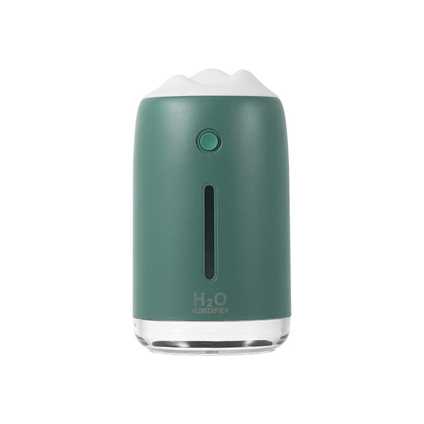 Dark night green mini humidifier with a white mountain-shaped top, clear base, and visible water level indicator.