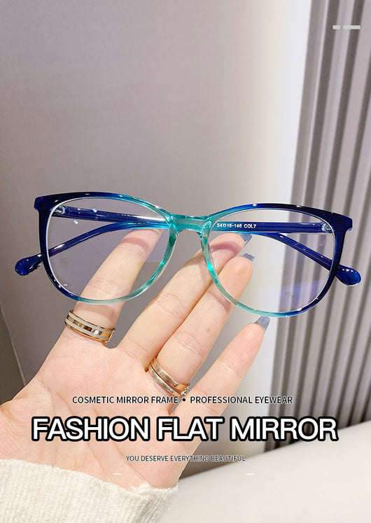 Black full-frame round anti-blue light glasses held by a hand with a gold ring and light blue gradient nails. - Image 26
