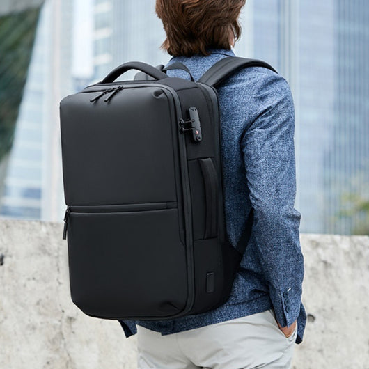 Mochila Profesional Impermeable para Hombre con Compresión Inteligente