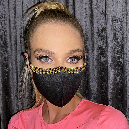 Woman wearing a black adjustable face mask with a shimmering silver rhinestone trim along the top edge. - Image 10