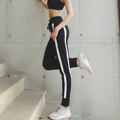 Pantalones deportivos con bolsillos laterales a rayas - Image 10
