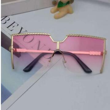 Frameless conjoined sunglasses with gold metal frame and braided detail, featuring brown gradient lenses. - Image 20
