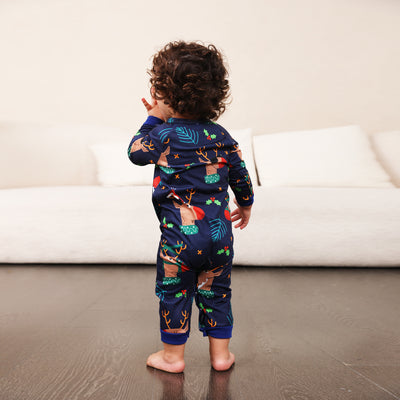 Family Christmas pajamas with a cartoon reindeer wearing a Santa hat and red scarf on a black top, and dark blue pants with a repeating reindeer and holly patte - Image 10