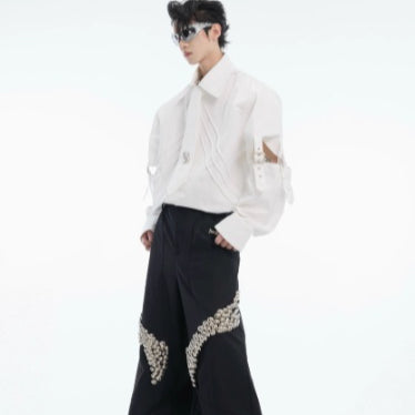 Blusa Blanca con Diseño de Cortes y Costuras Desconstruidas