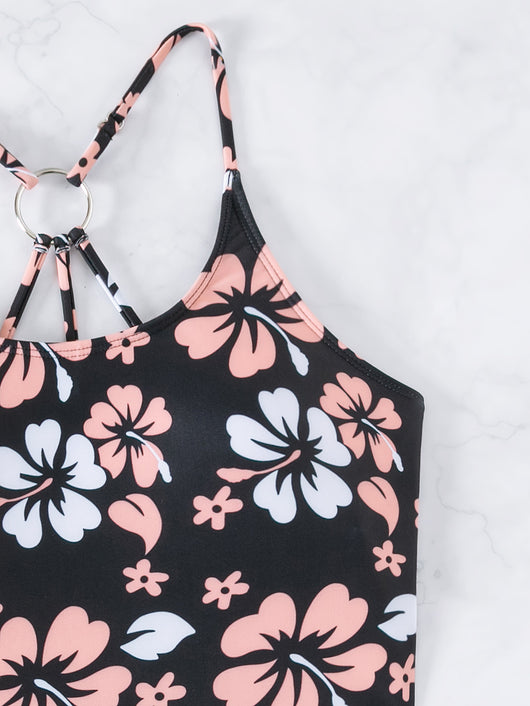 Women's two-piece swimsuit featuring a black halter crop top with pink and white floral print and solid black swim shorts. - Image 14