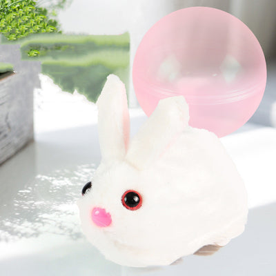 Beige plush simulated hamster cat toy with pink ears and a small tail, next to a translucent pink rolling ball. - Image 11