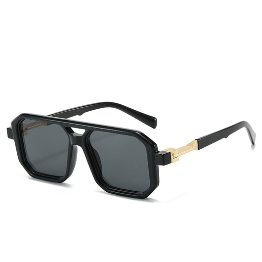 Black octagonal sunglasses with dark gray lenses and gold-colored temple accents, suitable for fashion wear. - Image 3