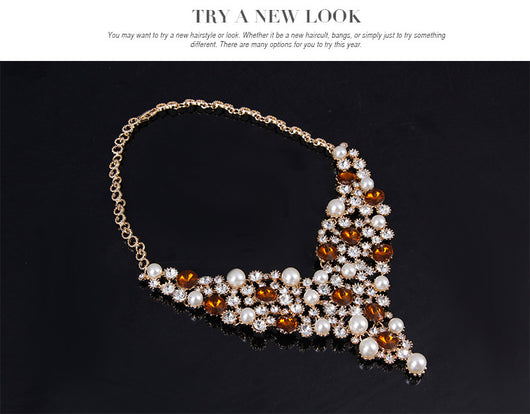 Four-piece bridal jewelry set with gold-toned necklace, earrings, bracelet, and ring, featuring amber and clear rhinestones with faux pearls. - Image 10