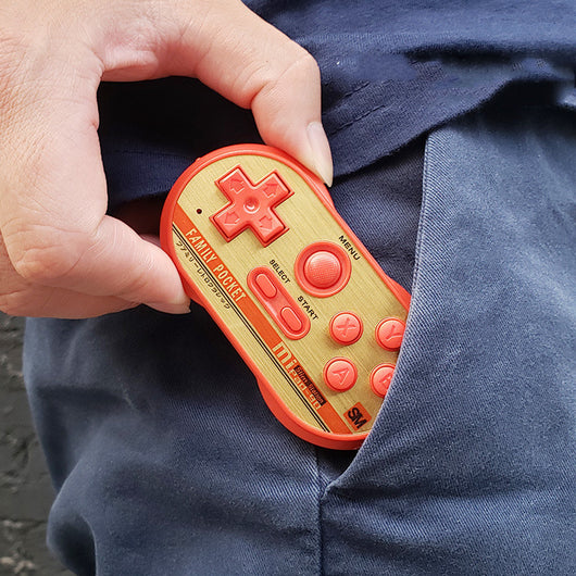 Blue and yellow mini TV handheld video game console with D-pad, joystick, and action buttons. - Image 12
