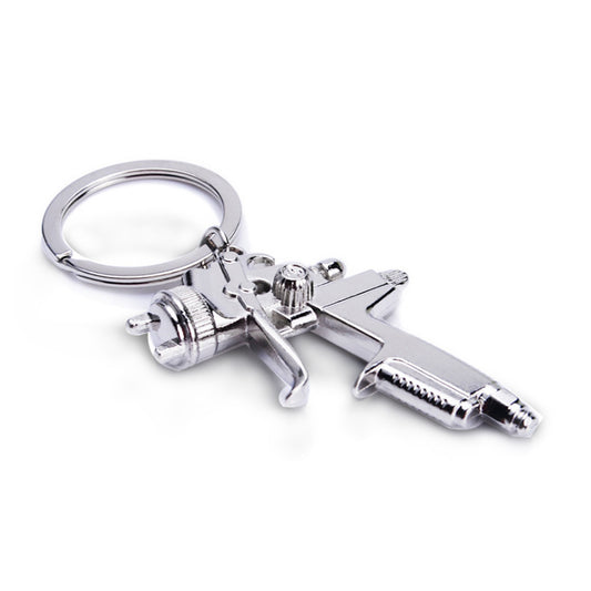 Llavero Pistola de Agua para Hombre - Juguete Miniatura Portátil
