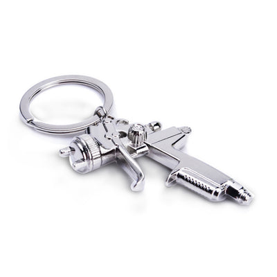 Llavero Pistola de Agua para Hombre - Juguete Miniatura Portátil