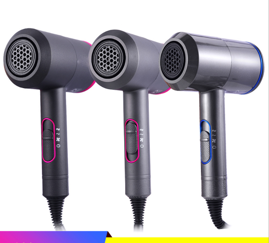 Dark grey hair dryer with pink accents and a perforated nozzle, featuring a slider switch on the handle. - Image 2