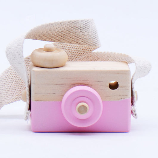 Two-tone wooden toy camera in natural wood and light blue with a cream fabric strap, for babies and kids. - Image 6