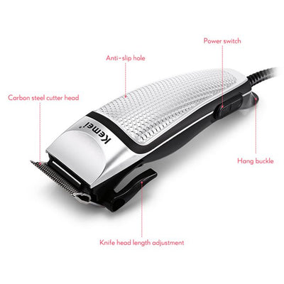 Kemei electric hair clipper kit with silver and black trimmer, four guide combs, scissors, comb, and cleaning brush. - Image 2