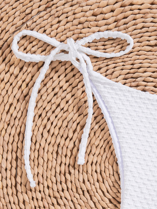 White polka dot three-piece swimsuit for women, featuring a halter bikini top with ruffled trim and matching high-waisted shorts. - Image 12